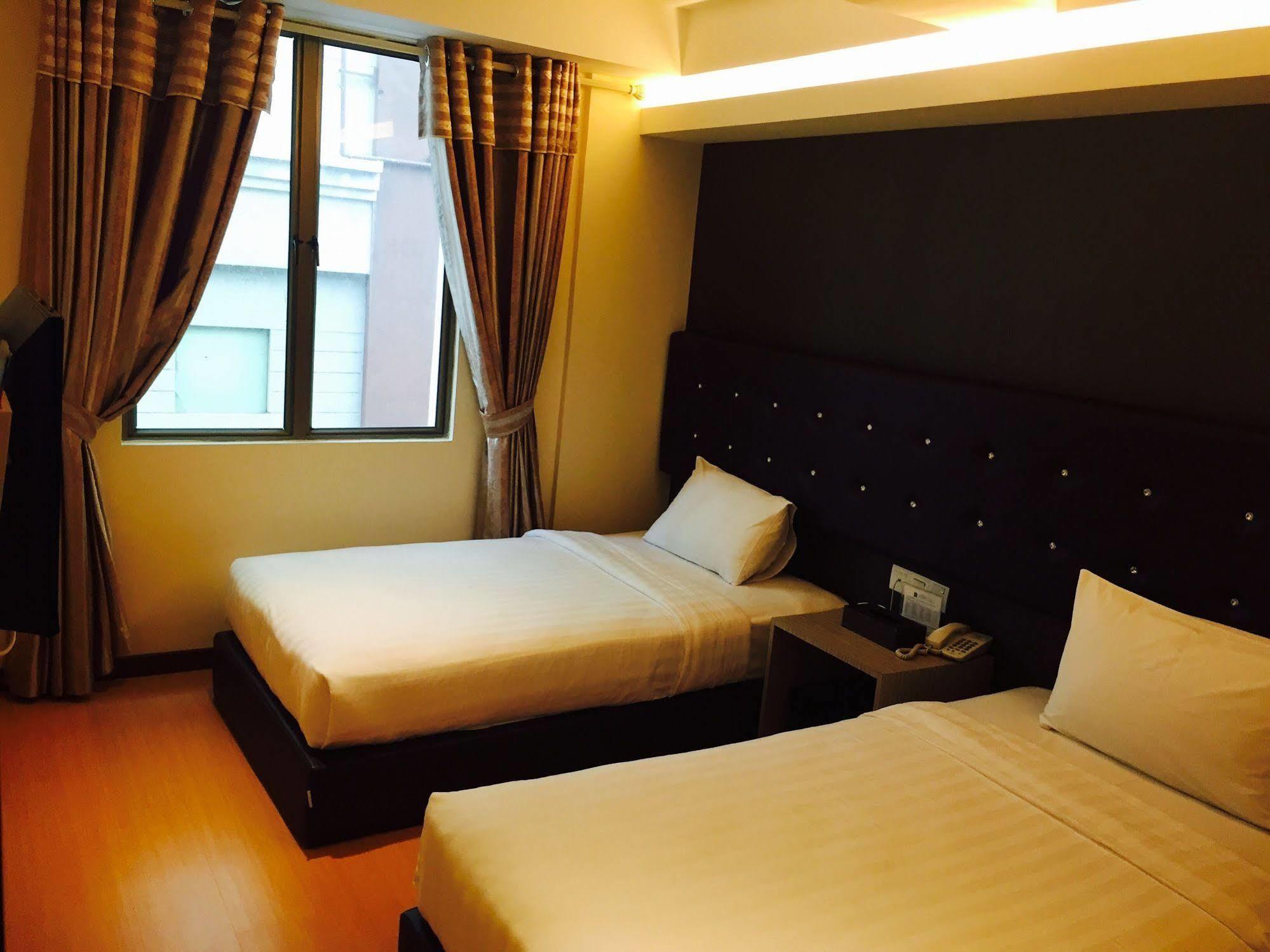 Ease Hotel Kota Kinabalu Extérieur photo